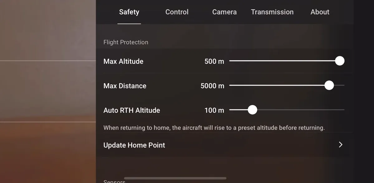 The DJI Fly Safety tab with Max Altitude set to its 500 m maximum, alongside Max Distance and Auto RTH Altitude sliders