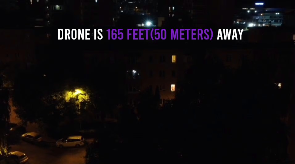 Consumer drone camera view at 50 meters altitude at night